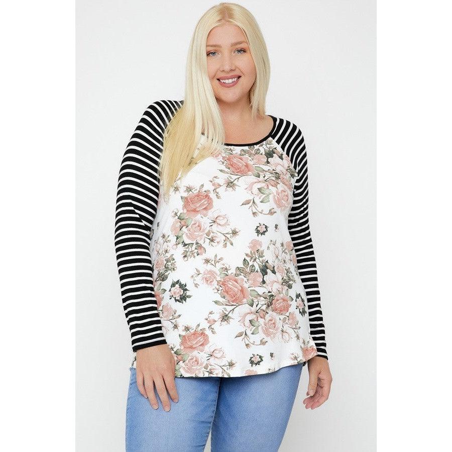 Floral Top Featuring Raglan Style Striped Sleeves And A Round Neck